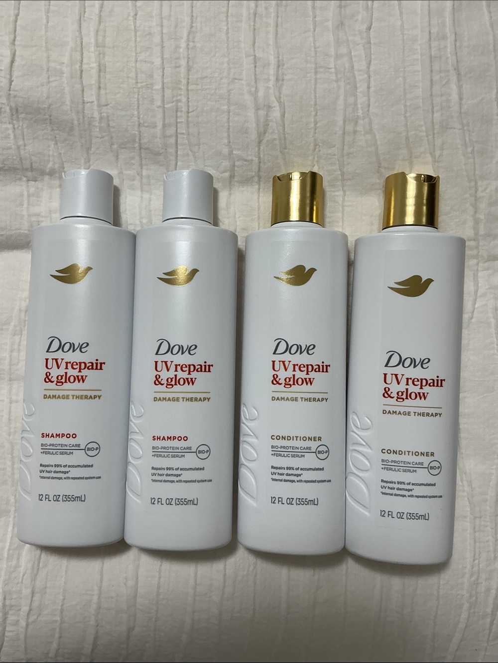 DOVE UV REPAIR AND GLOW DAMAGE THERAPY SHAMPOO & CONDITIONER BUNDLE